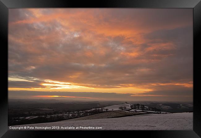 Raddon Top sunset in the snow Framed Print by Pete Hemington