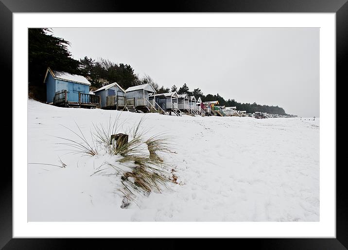 Snowy Wells Beach Huts Framed Mounted Print by Paul Macro