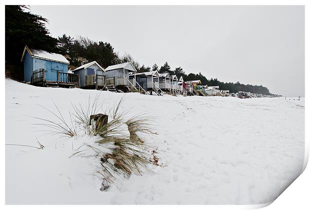 Snowy Wells Beach Huts Print by Paul Macro