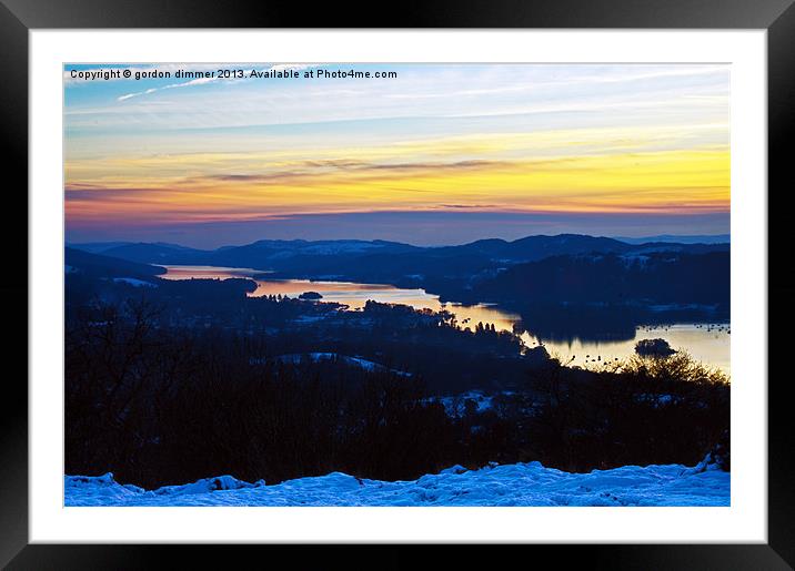 low sun over snowy windermere Framed Mounted Print by Gordon Dimmer