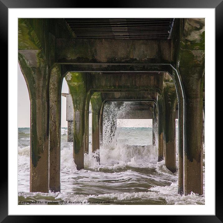 Waves under the pier Framed Mounted Print by Phil Wareham