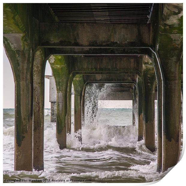 Waves under the pier Print by Phil Wareham