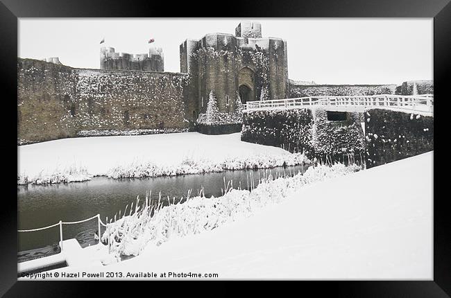 Caerphilly Castle on a snowy day Framed Print by Hazel Powell