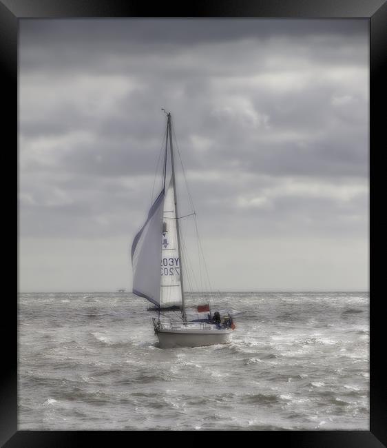 Yacht at Sea Framed Print by Nigel Jones