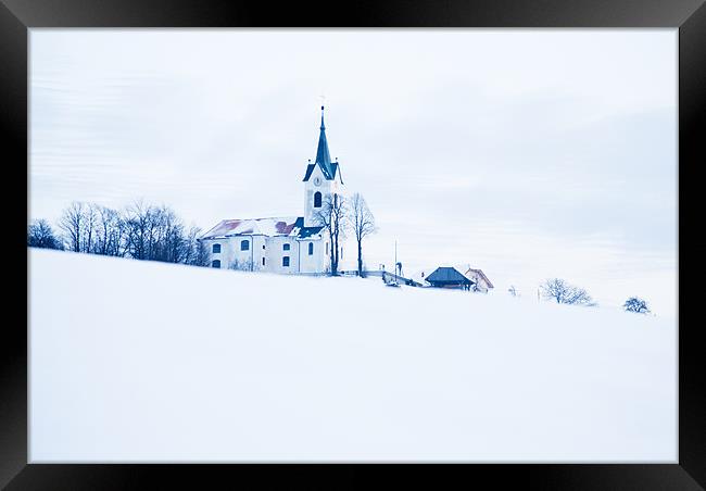 Snowy church Framed Print by Ian Middleton