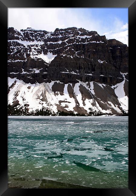 Icy Lake with Mountains Framed Print by Megan Winder