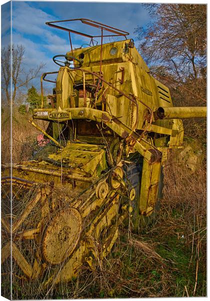 retired combine harvester Canvas Print by Jo Beerens