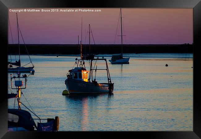 Fishing boat catches the last rays Framed Print by Matthew Bruce