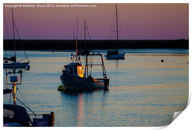 Fishing boat catches the last rays Print by Matthew Bruce