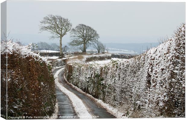 Hill top lane in snow Canvas Print by Pete Hemington