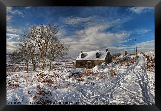 Derelict cottage in the snow Framed Print by Richard Smith