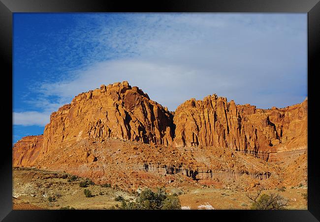 Red rock walls under blue and white sky, Utah Framed Print by Claudio Del Luongo