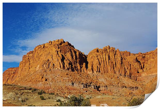 Red rock walls under blue and white sky, Utah Print by Claudio Del Luongo