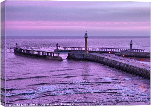 Sunrise over Whitby. Canvas Print by Lilian Marshall