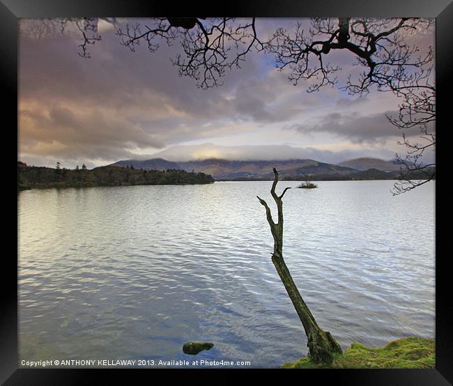 STORM BREWING OVER DERWENT WATER Framed Print by Anthony Kellaway