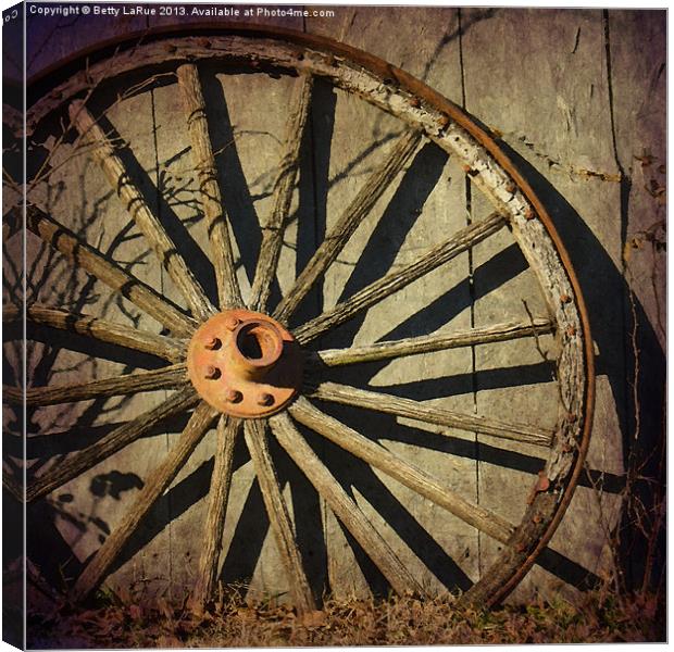 Old West Wagon Wheel Canvas Print by Betty LaRue