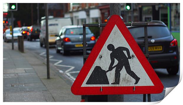 Street sign digging busy road Print by Marc Reeves