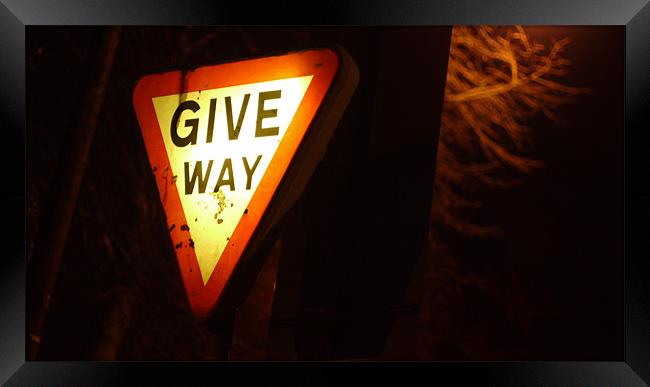 Give way sign at night Framed Print by Marc Reeves