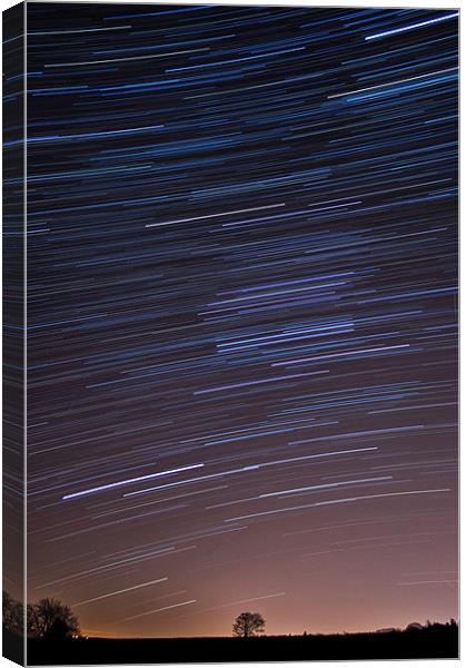Star trails; as we orbit the vast Solar system Canvas Print by