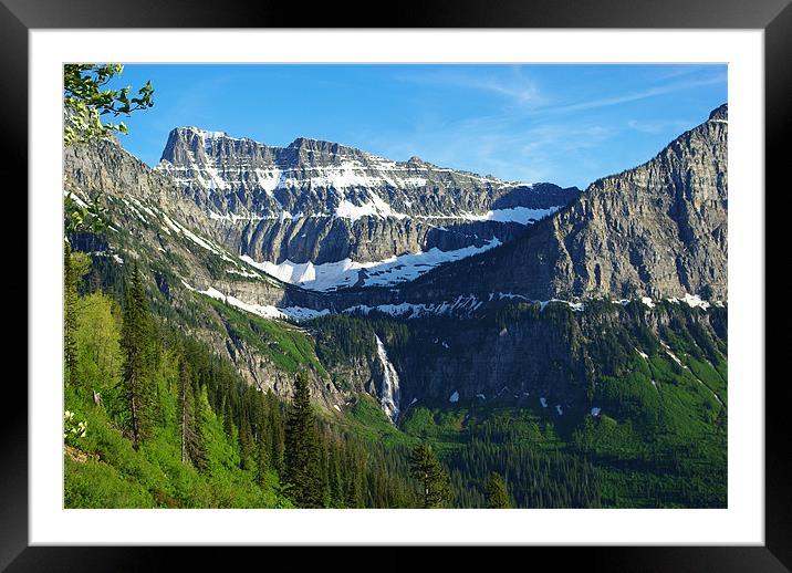 High mountains and waterfall near Logan Pass, Mont Framed Mounted Print by Claudio Del Luongo