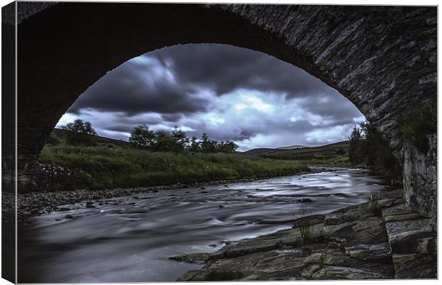 ...like a bridge over troubled waters. Canvas Print by Douglas McMann