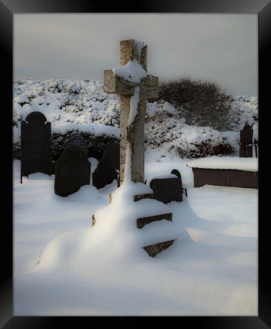 Graveyard in Snow Framed Print by Gail Johnson