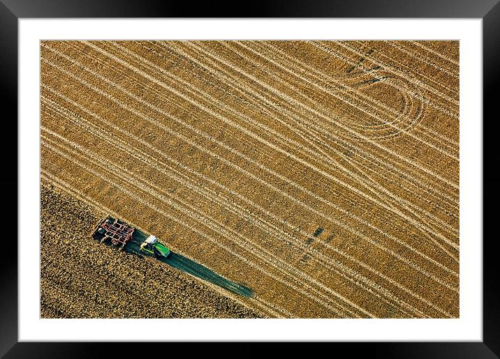 Ploughing the Land Framed Mounted Print by Mark Llewellyn