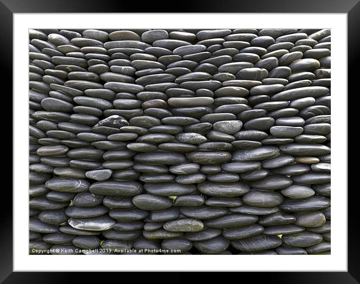 Wall of pebbles Framed Mounted Print by Keith Campbell