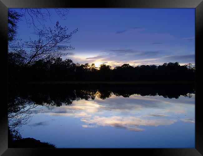 Sunrise reflections Framed Print by Carol Young
