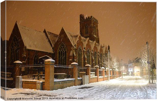 St Marys Acton in the snow. Canvas Print by Malcolm Snook