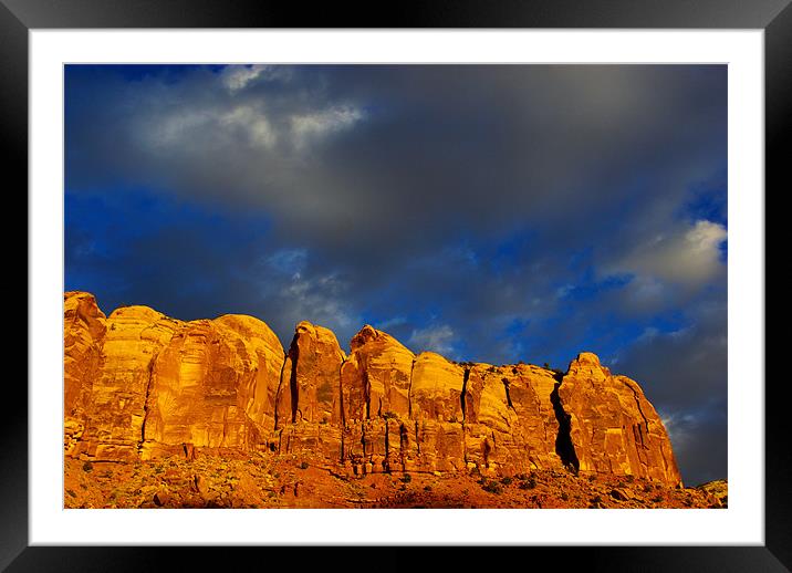 Rock wall in last evening sun Framed Mounted Print by Claudio Del Luongo