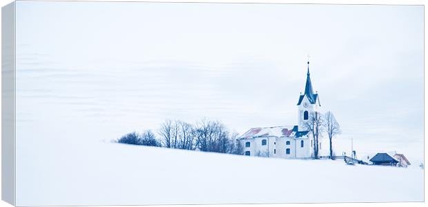 Snowy church Canvas Print by Ian Middleton