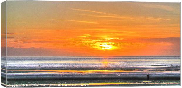 Anthony Gormleys Another Place at Sunset Canvas Print by John Wain