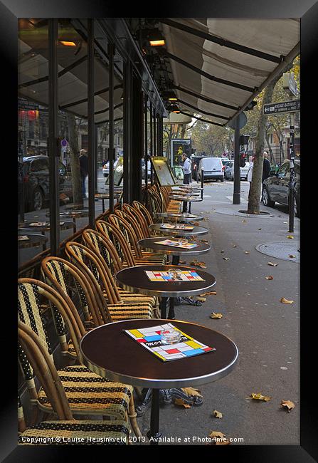 Tables outside a Paris bistro Framed Print by Louise Heusinkveld