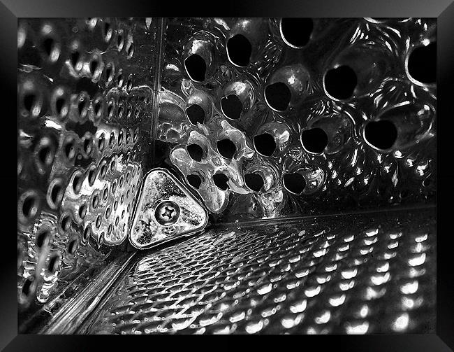 Inside the cheese grater Framed Print by Michael Thompson