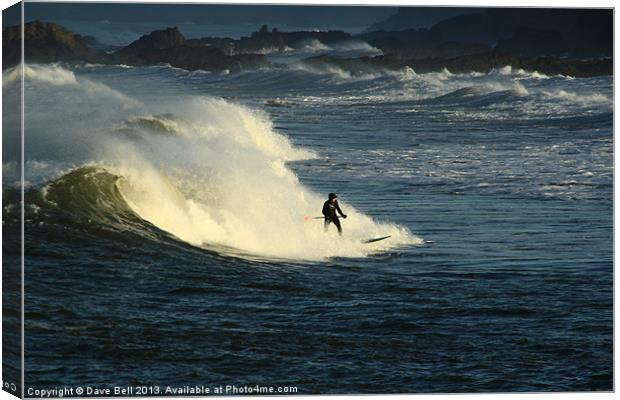 Winter Paddle Boarding at Bude North Cornwall UK Canvas Print by Dave Bell