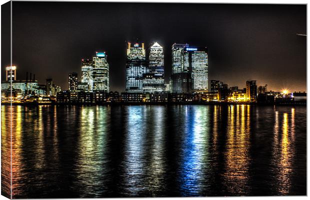 canary wharf across the thames Canvas Print by jim wardle-young