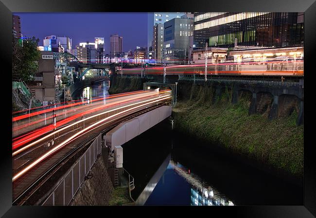 Light Trails Weave Through Tokyo Framed Print by Duane Walker