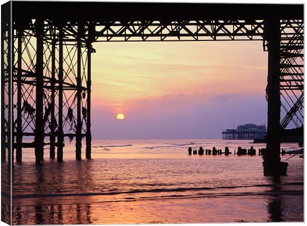 West Pier from under Palace Pier, Brigton Canvas Print by Maggie McCall
