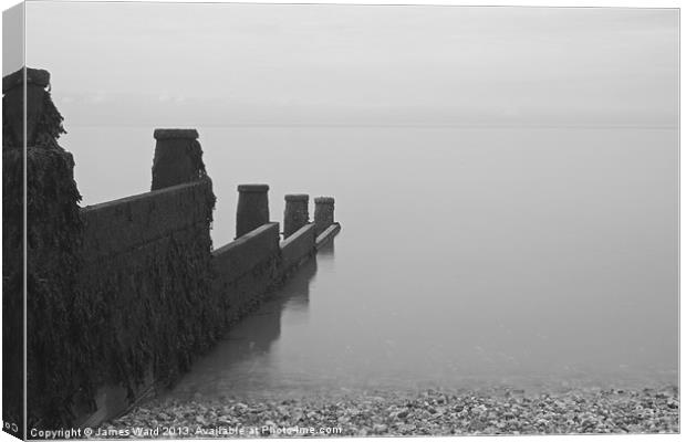 Whitstable Beach on a calm day Canvas Print by James Ward
