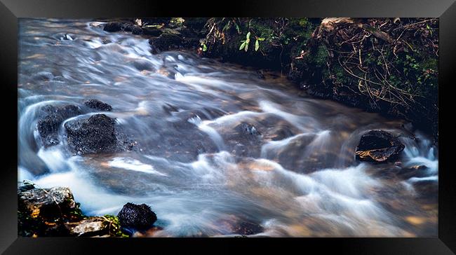 Flowing waters Framed Print by Simon West