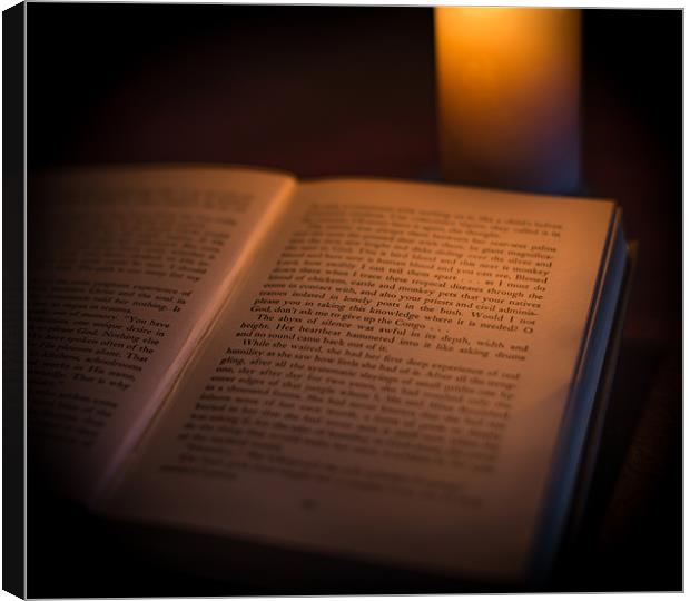 Reading by Candlelight Canvas Print by Ian Johnston  LRPS
