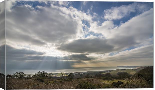 Rays over the coast landscape Canvas Print by Ian Johnston  LRPS