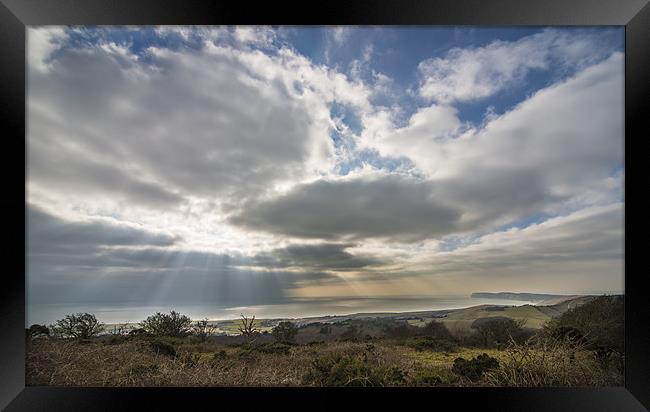 Rays over the coast landscape Framed Print by Ian Johnston  LRPS