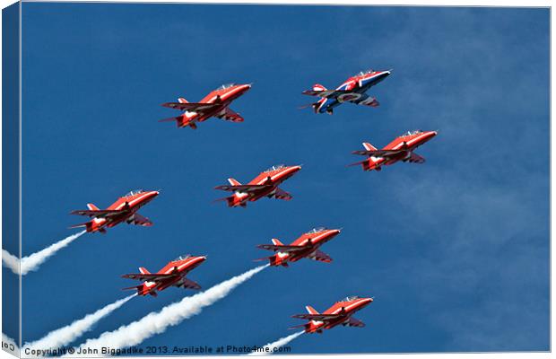 Red Arrows Canvas Print by John Biggadike