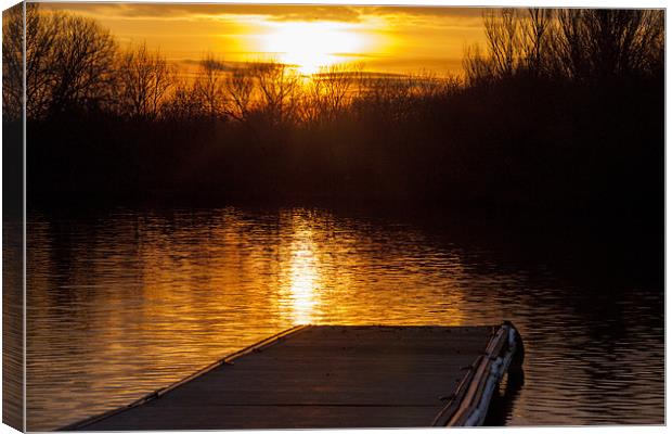 Sunset over lake from pontoon Canvas Print by Simon West