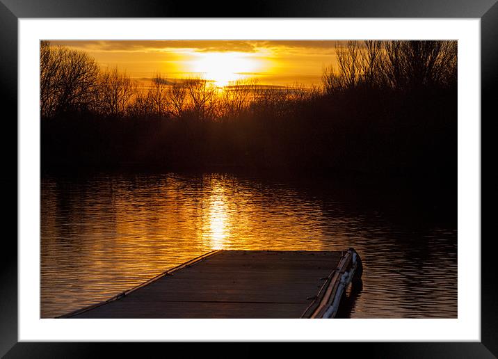 Sunset over lake from pontoon Framed Mounted Print by Simon West
