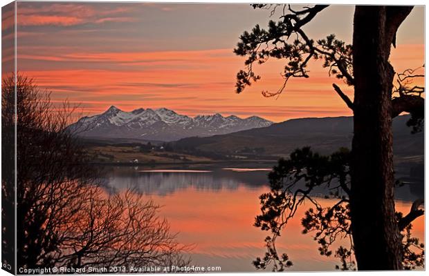 Sunset colours across Loch Portree Canvas Print by Richard Smith