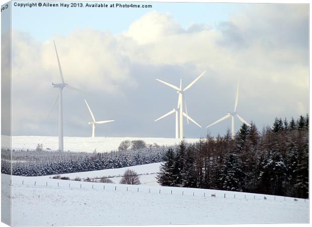 Wind Turbines in Snow Canvas Print by Aileen Hay