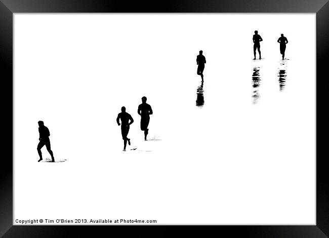 People Running On White Beach Framed Print by Tim O'Brien